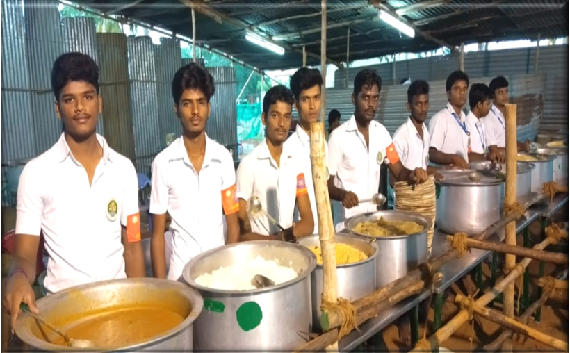 Food distribution by NSS volunteers to devotees of lord Muruga at Kandasamy Temple, Kalippatti Village, Namakkal 